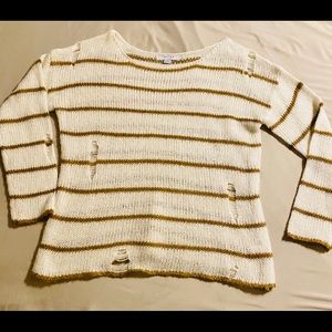 Sweater with little holes .